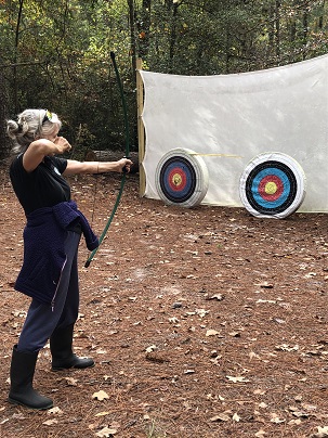 Ann taking dead aim at the target.